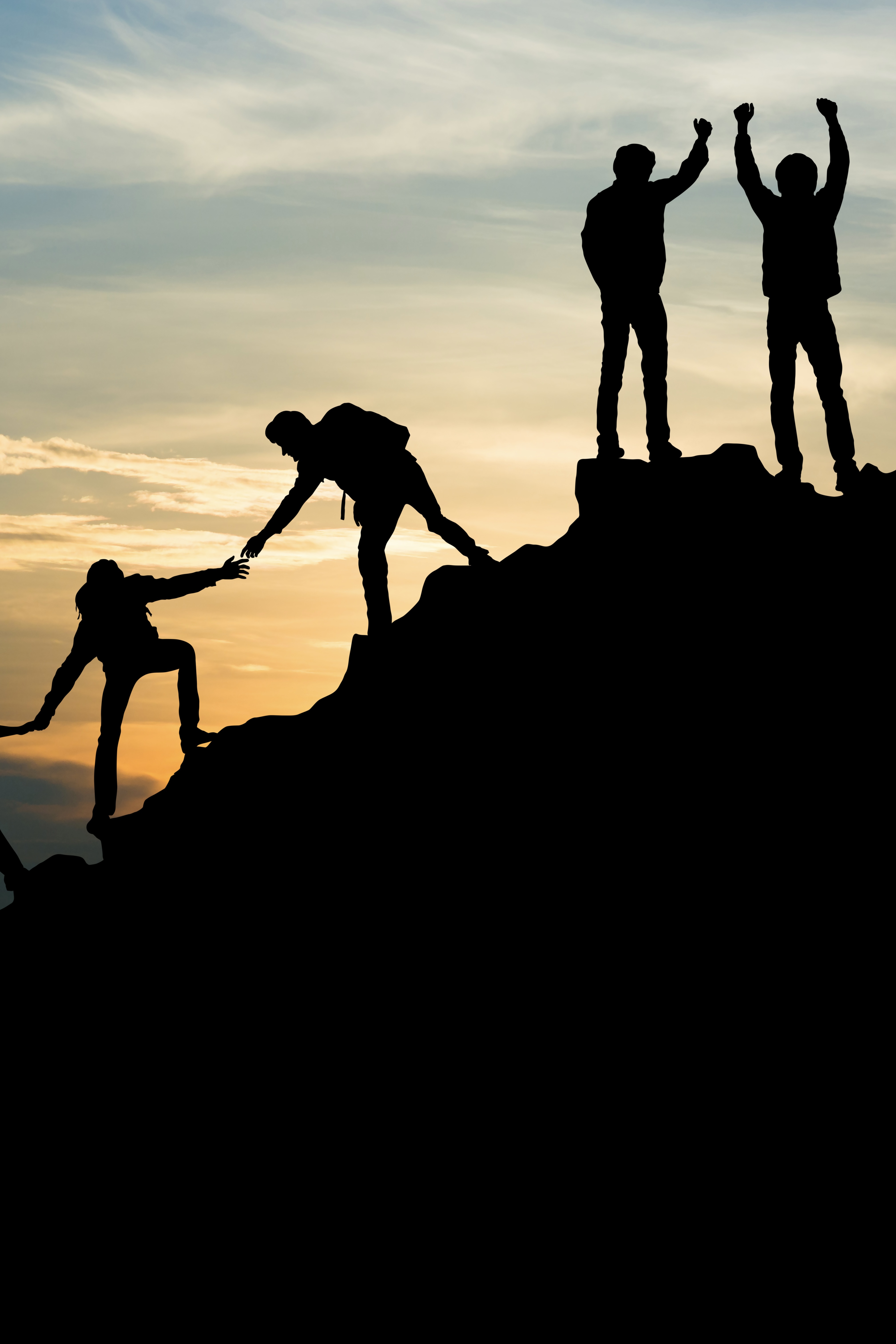 Team climbing a hill